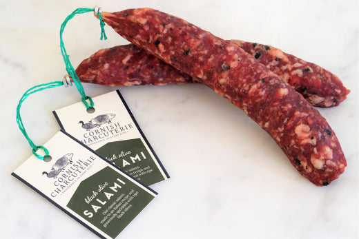 A Mediterranean twist on our traditional salami. Our Cornish Charcuterie Black Olive Salami is made with hand-chopped black olives that are incorporated following the mincing stage. 
